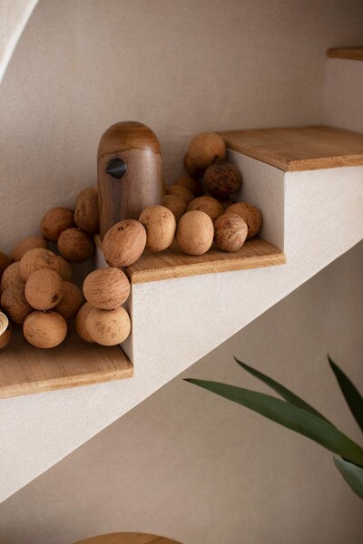 Textured Arched Shelving Unit With Stairs