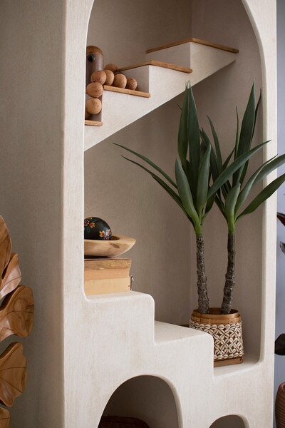Textured Arched Shelving Unit With Stairs