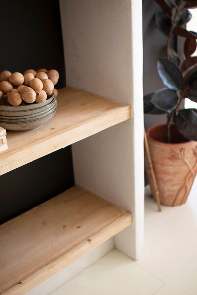 Textured Shelving Unit With Four Wooden Shelves #1